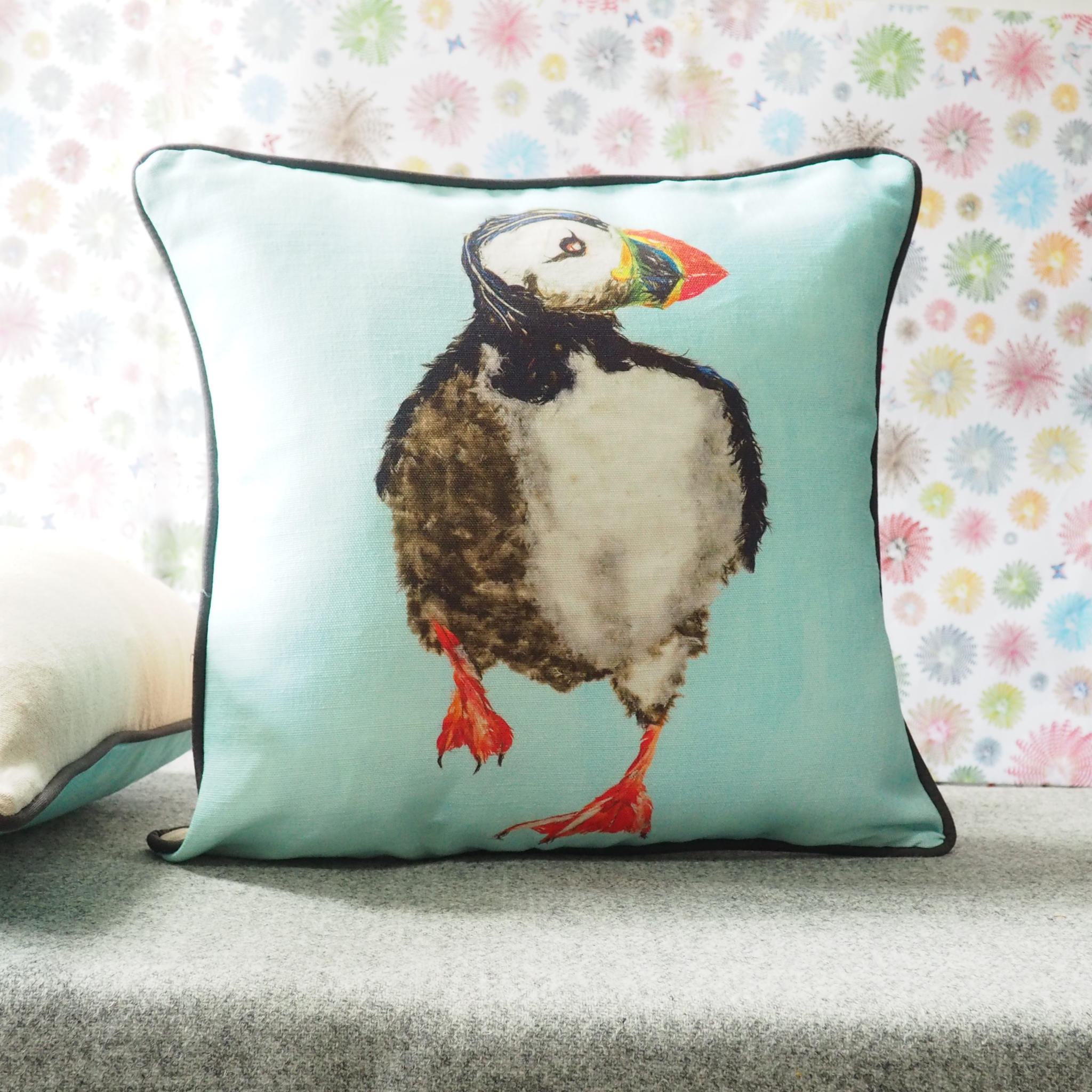 Puffin Running on Blue Background cushion