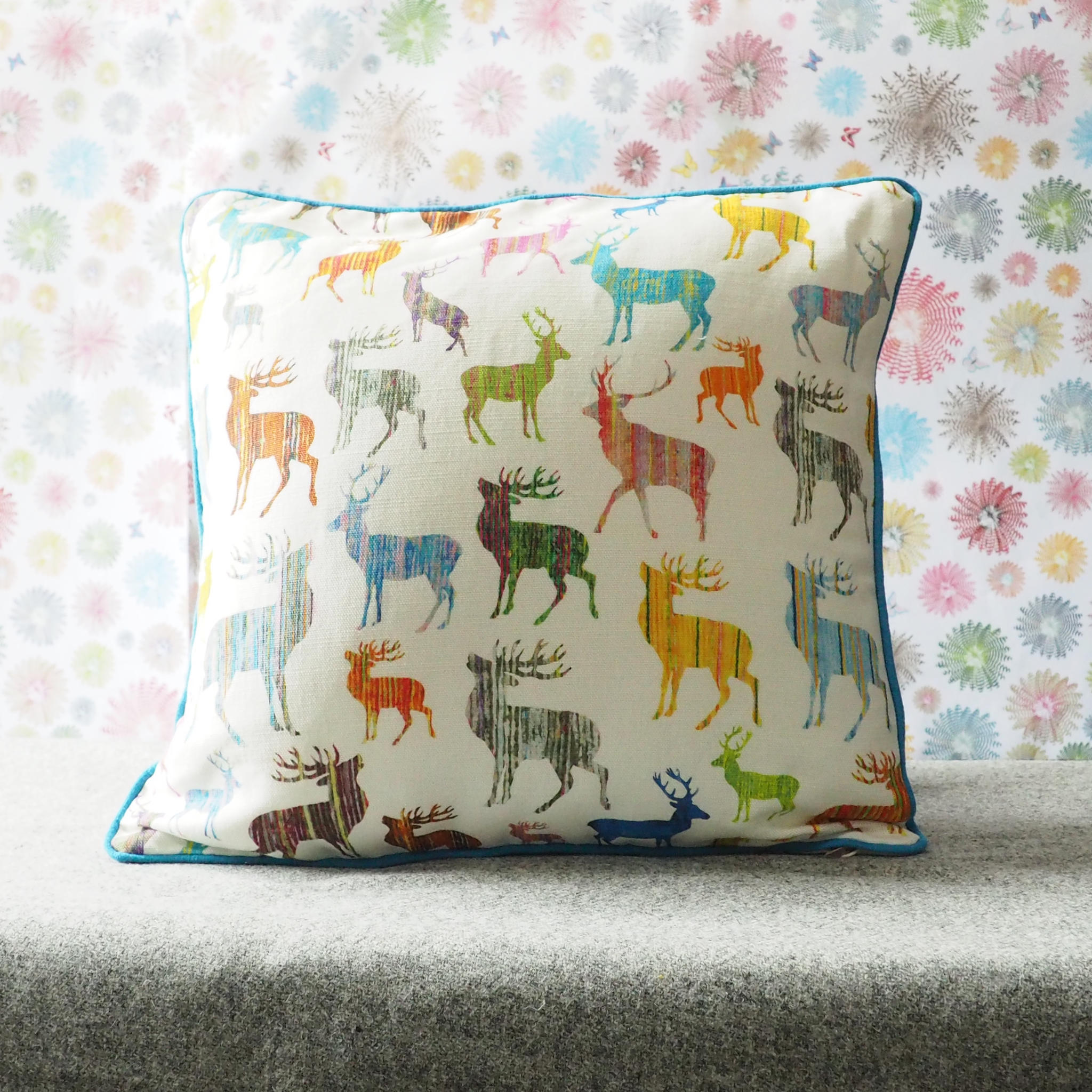 Multi coloured stag cushion by Chloe Gardner