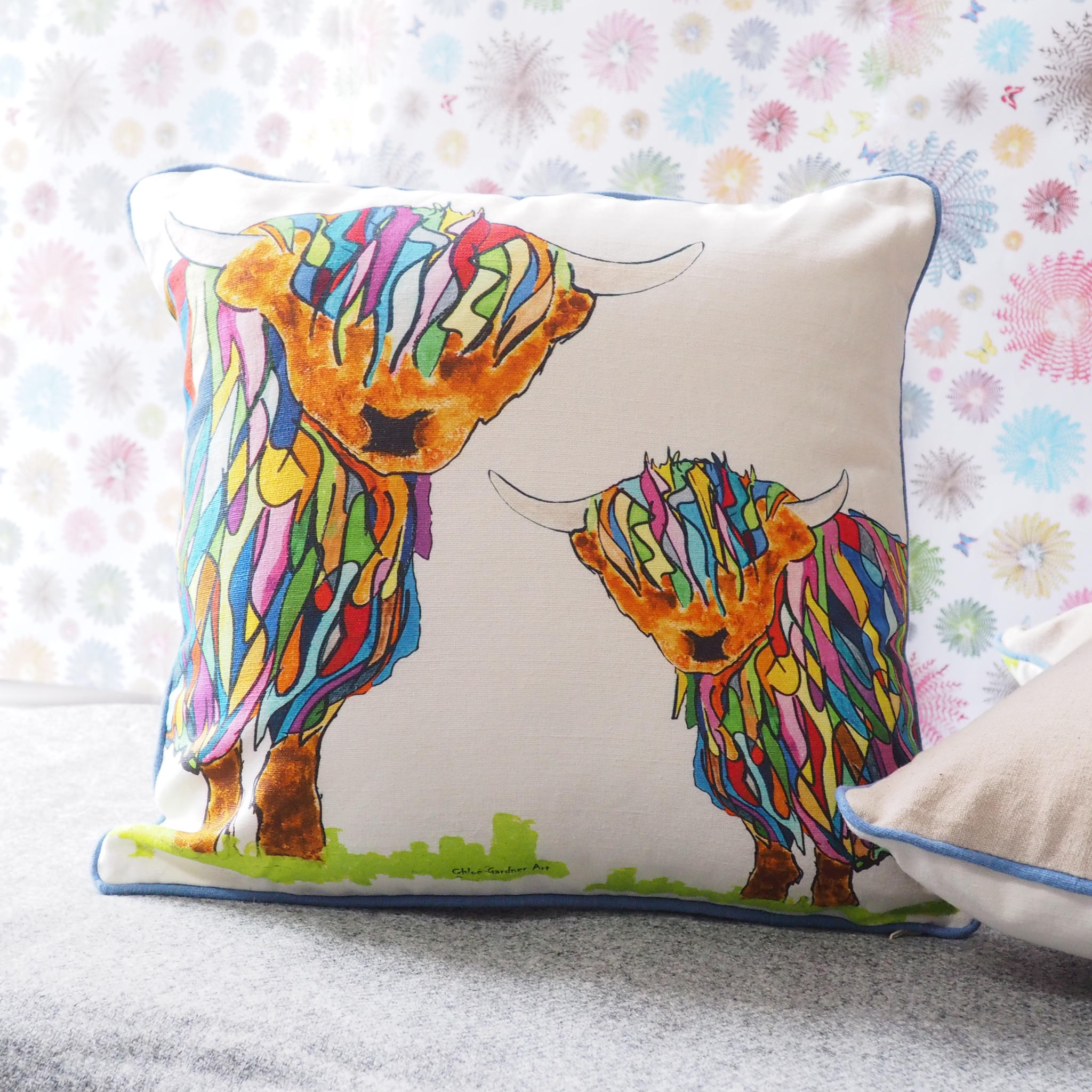 Bright Cow and Baby Cushion by Chloe Gardner