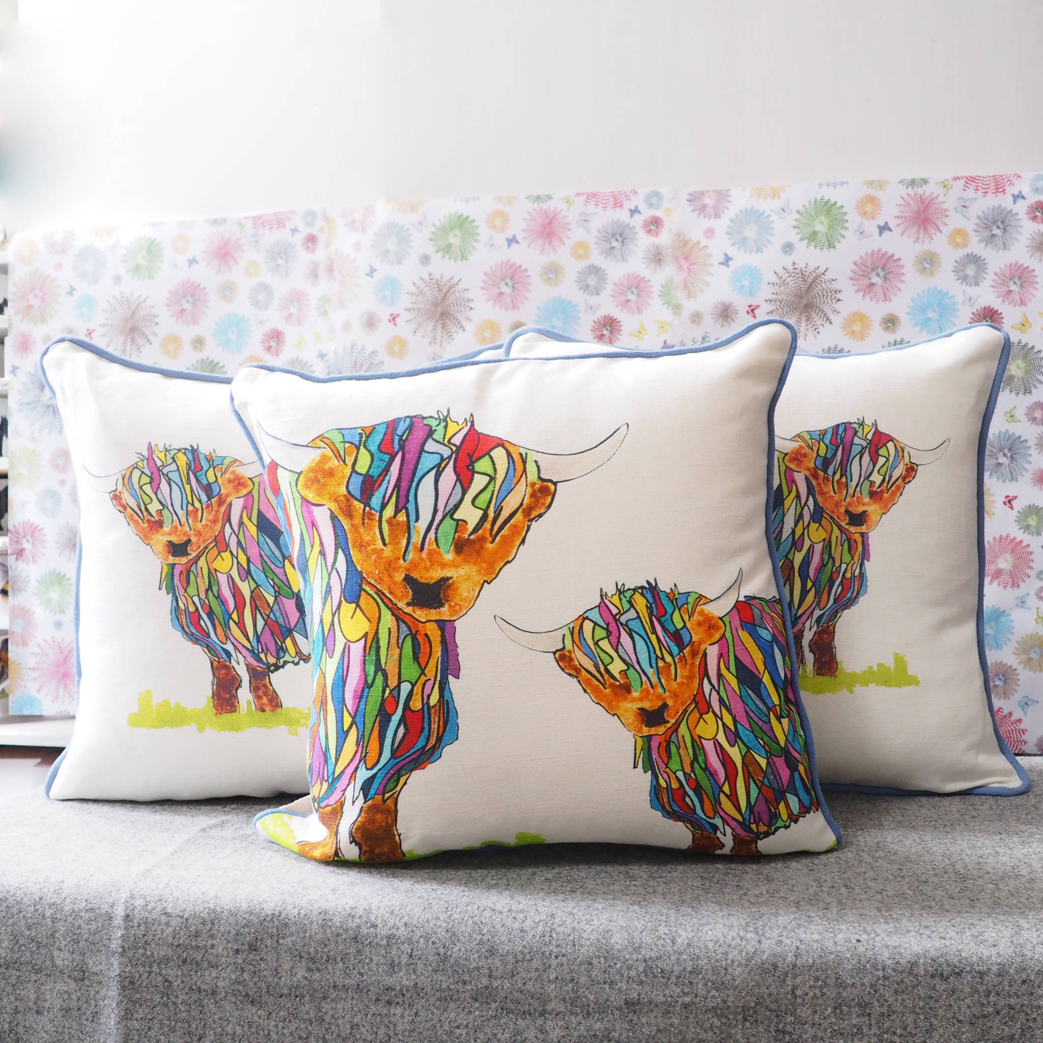 Bright Highland Cow and baby Cushion by Chloe Gardner Bright Highland Cow and baby Cushion by Chloe Gardner