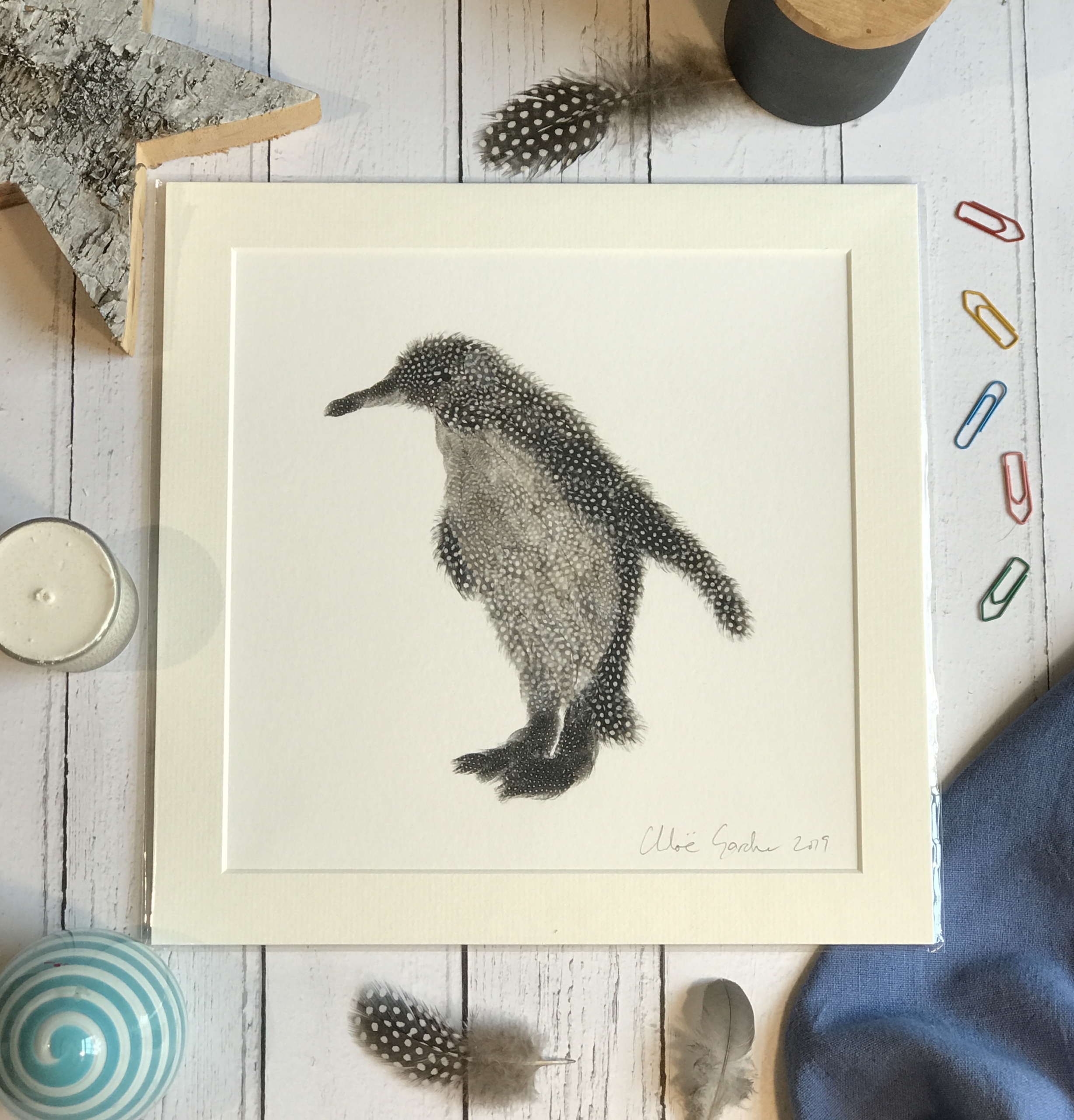 Unframed Print - Square in a mount and bag for 12 inch frame - feather penguin  (Avail:8 02/24)
