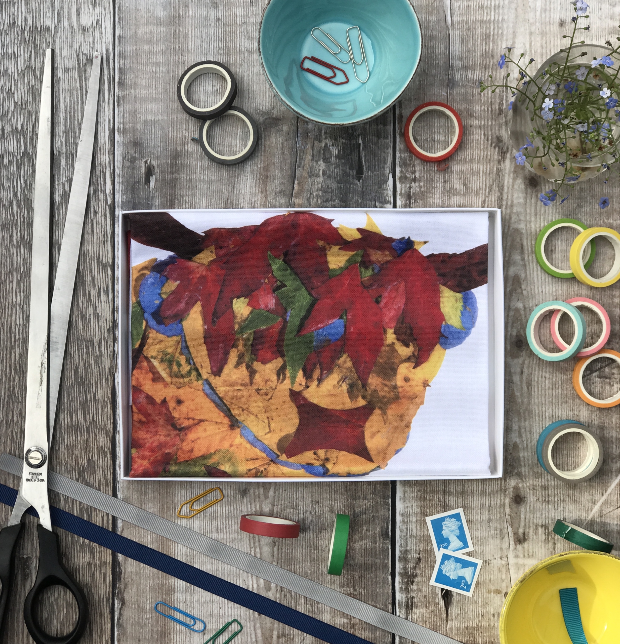 tea towel folded in an open box LHC cow