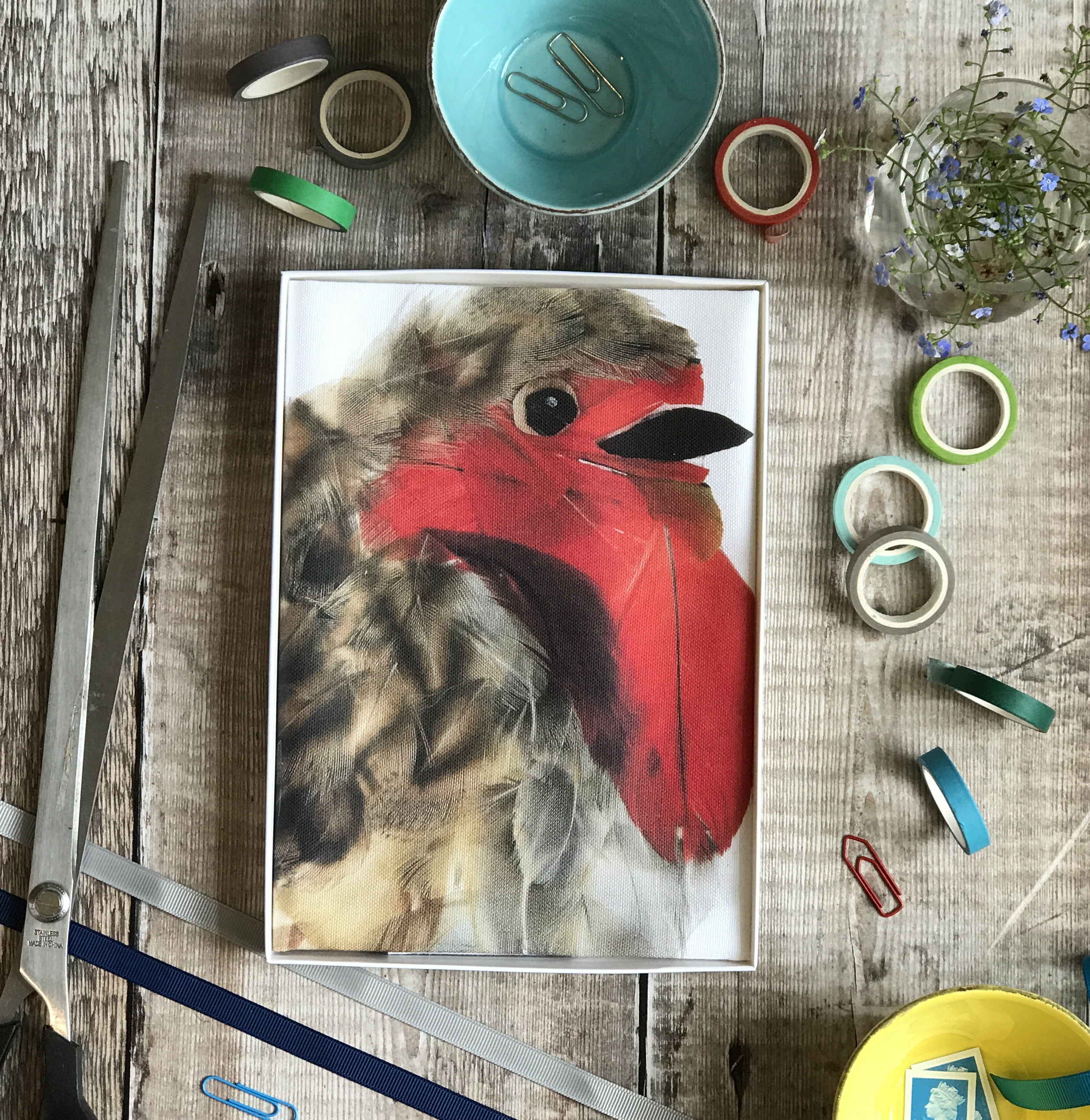 tea towel folded in an open box robin