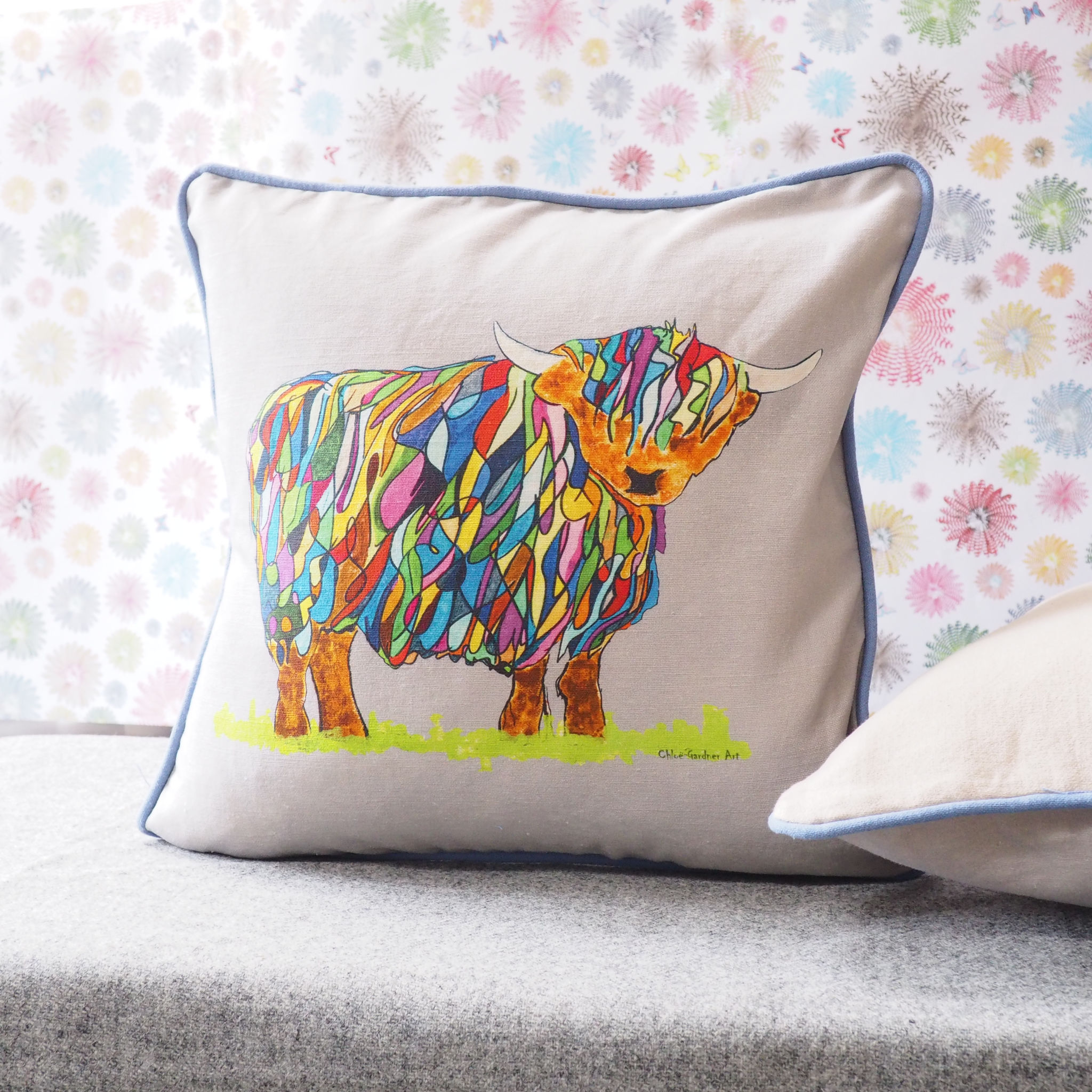 Bright Highland Cow Cushion in Grey by Chloe Gardner