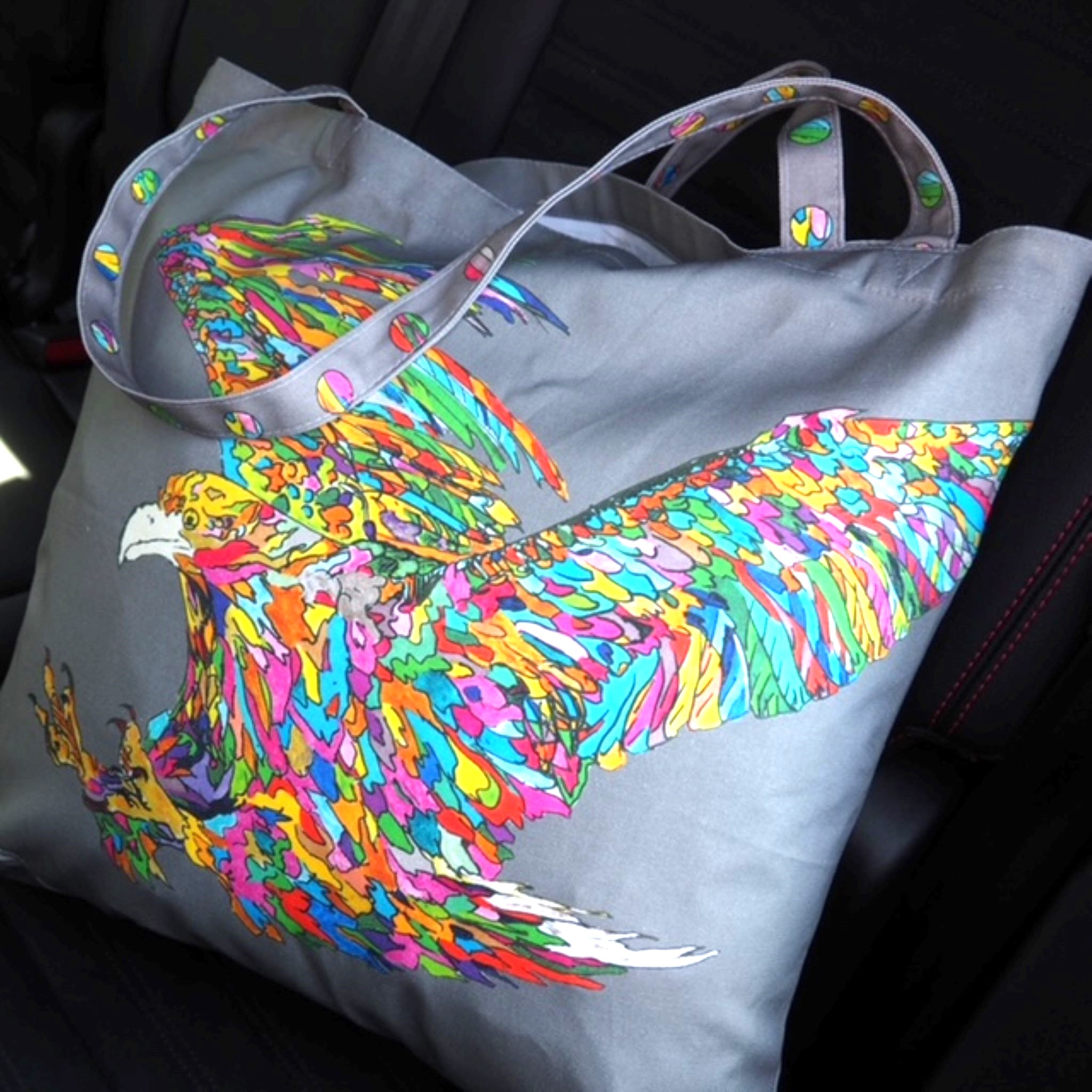Eagle Bag on Black Background by Chloe Gardner Eagle Bag with colourful Eagle on Grey canvas bag