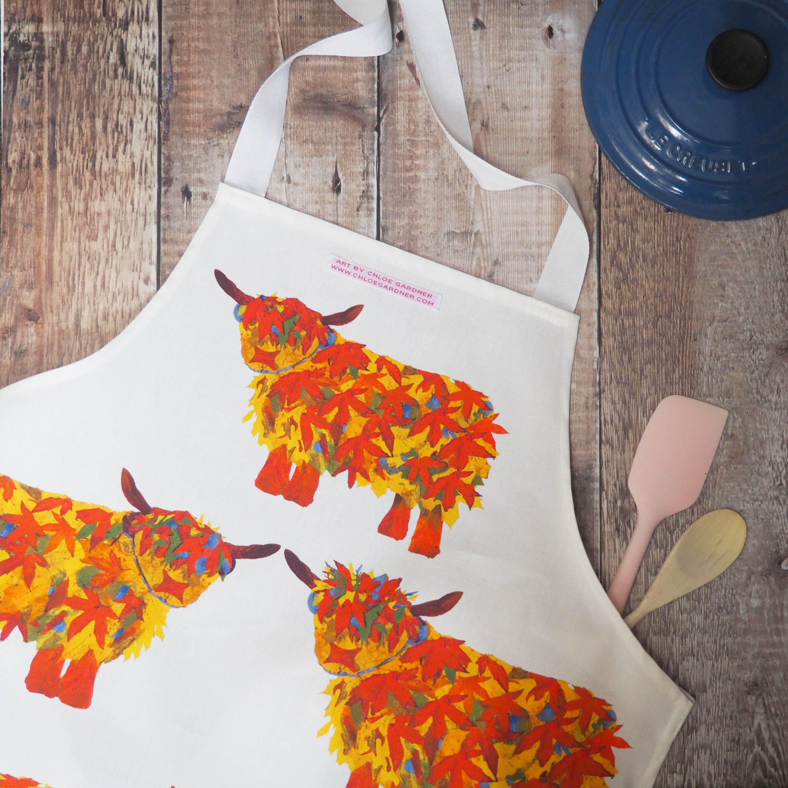Highland Cow Apron with orage toned cows made from autun leaves