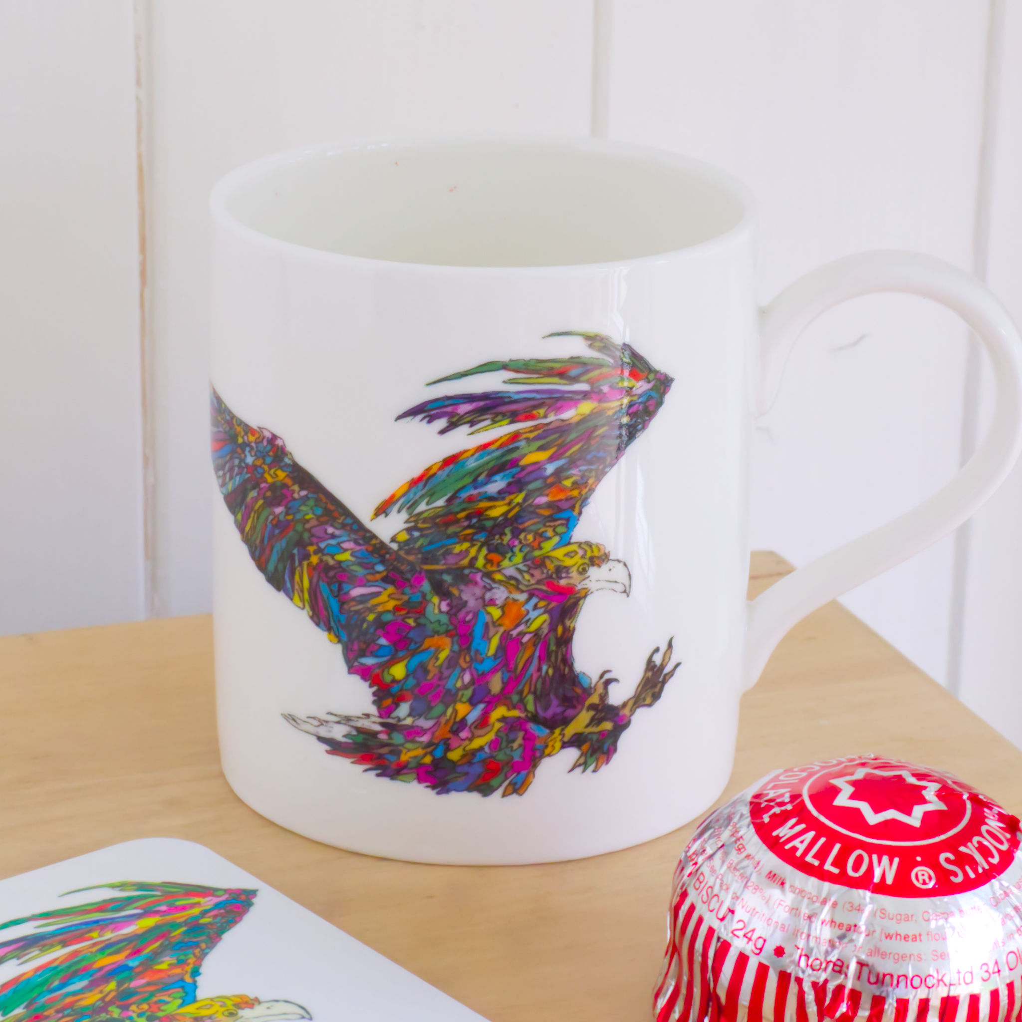 Eagle China Mug pictured with matching coaster and tunnocks teacake