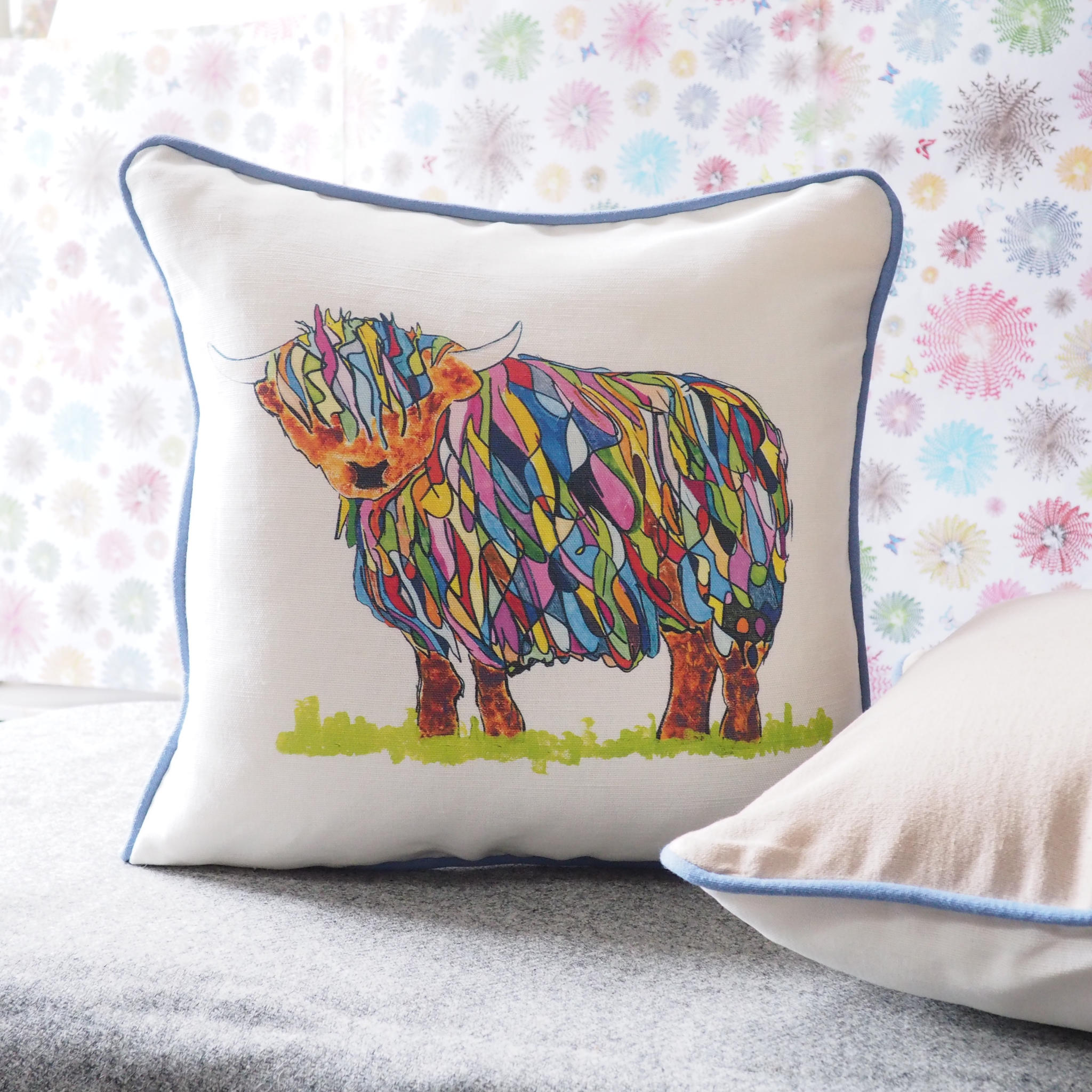Bright Highland Cow Looking Left Cushion by Chloe Gardner